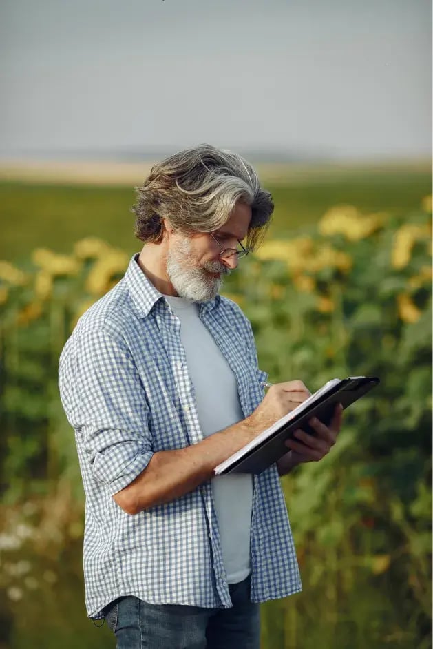 farmer-examines-field-agronomist-farmer-examines-growth-wheat